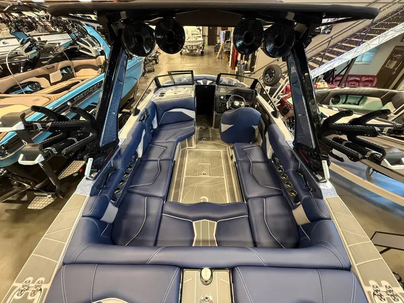 Slide: The Image of Interior of Centurion Fe23 boat, 2026 model, featuring blue leather seating. - 3