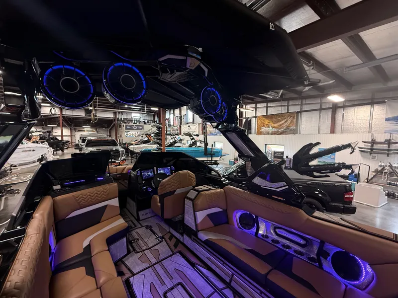 Slide: The Image of Interior of 2025 Centurion Ri245 with blue LED lighting. - 11