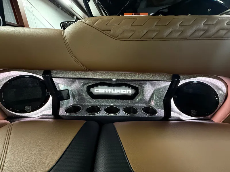 Slide: The Image of Interior of 2025 Centurion Ri245 with speakers and logo. - 13