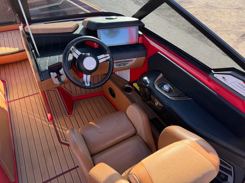 Slide: The Image of Interior of a 2021 Nautique G25 boat with modern cockpit. - 13