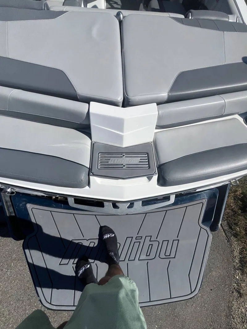 Slide: The Image of 2022 Malibu Wakesetter 22 LSV boat with gray upholstery. - 5