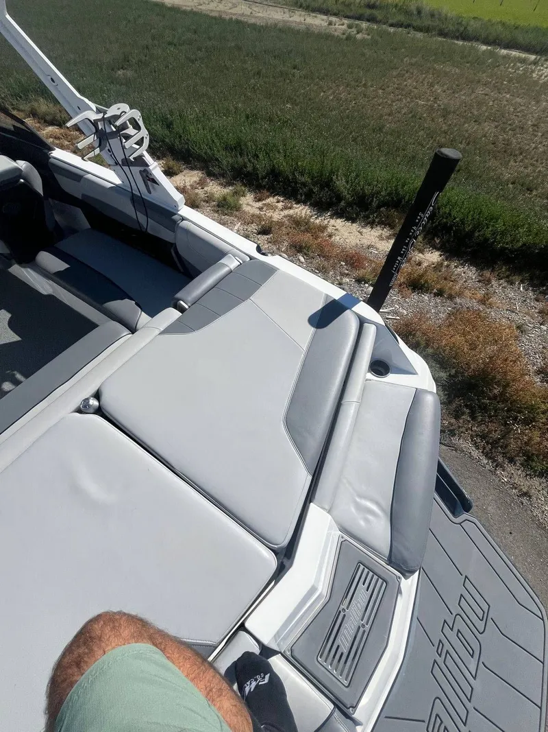 Slide: The Image of 2022 Malibu Wakesetter 22 LSV boat with gray upholstery. - 6
