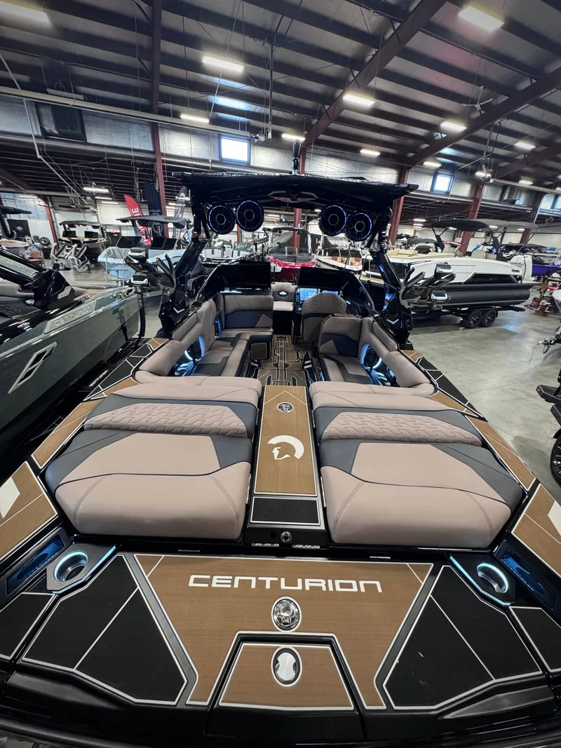 Slide: The Image of 2026 Centurion Ri245 boat with luxurious interior and modern design. - 12