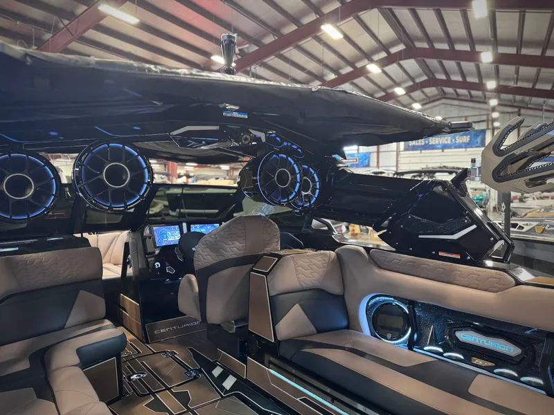 Slide: The Image of Interior of 2026 Centurion Ri245 featuring modern speakers and luxurious seating. - 14