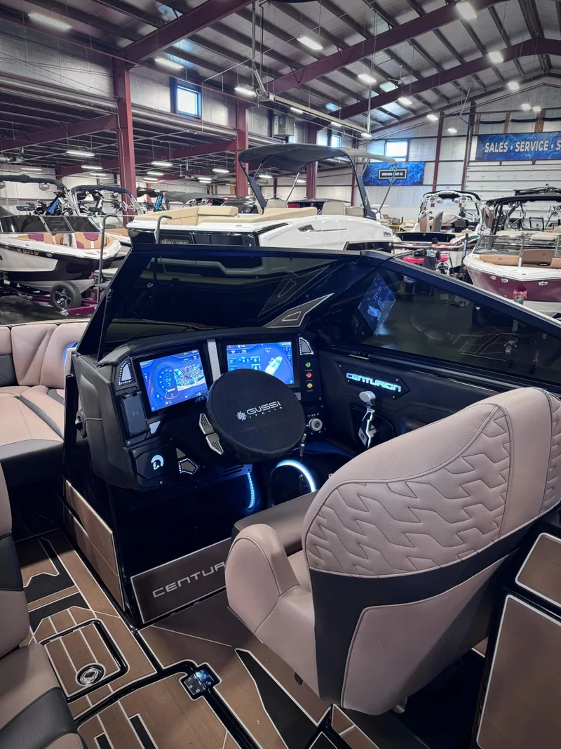 Slide: The Image of Interior of 2026 Centurion Ri245 with modern helm console. - 17