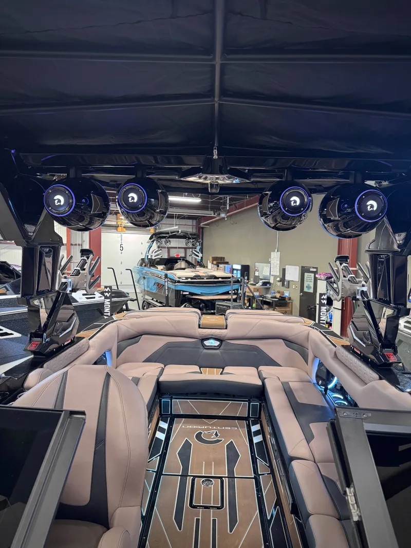 Slide: The Image of Interior view of 2026 Centurion Ri245 boat with luxurious features. - 20