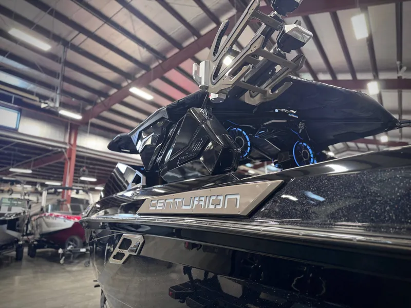 Slide: The Image of 2026 Centurion Ri245 boat in a warehouse setting. - 21
