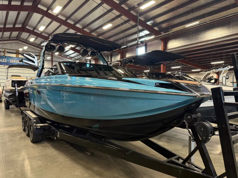 The Image of 2020 Centurion Ri257 boat in a showroom. - 1