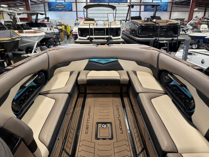 Slide: The Image of Interior view of a 2020 Centurion Ri257 boat in a showroom. - 12