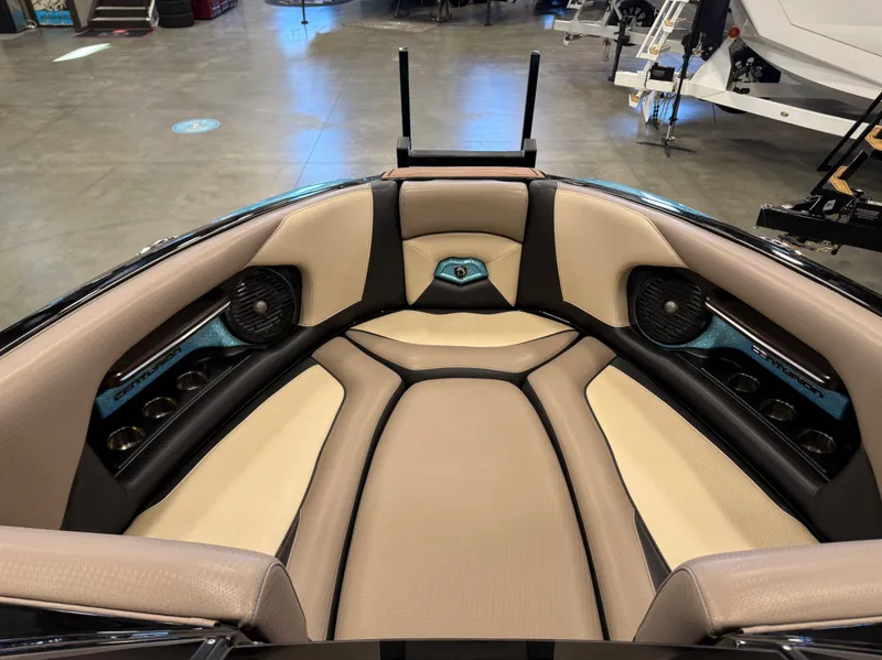 Slide: The Image of Interior of a 2020 Centurion Ri257 boat with luxurious seating and speakers. - 14