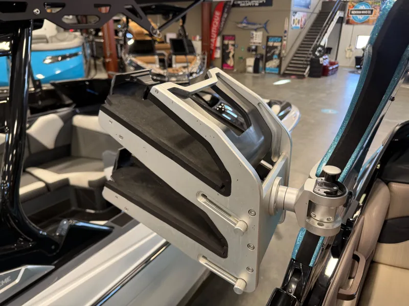 Slide: The Image of 2020 Centurion Ri257 boat with wakeboard rack in interior view. - 15