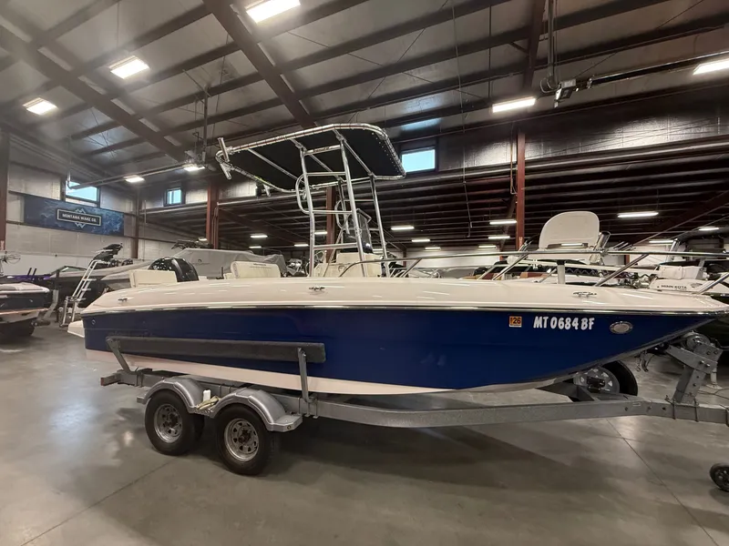 The Image of 2018 Bayliner Element F21 boat in a warehouse. - 1