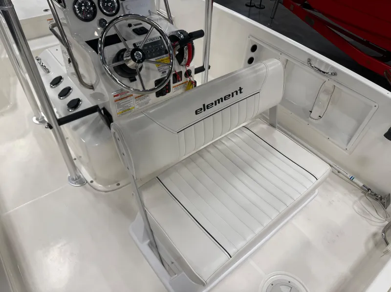 Slide: The Image of Interior view of a 2018 Bayliner Element F21 boat. - 15