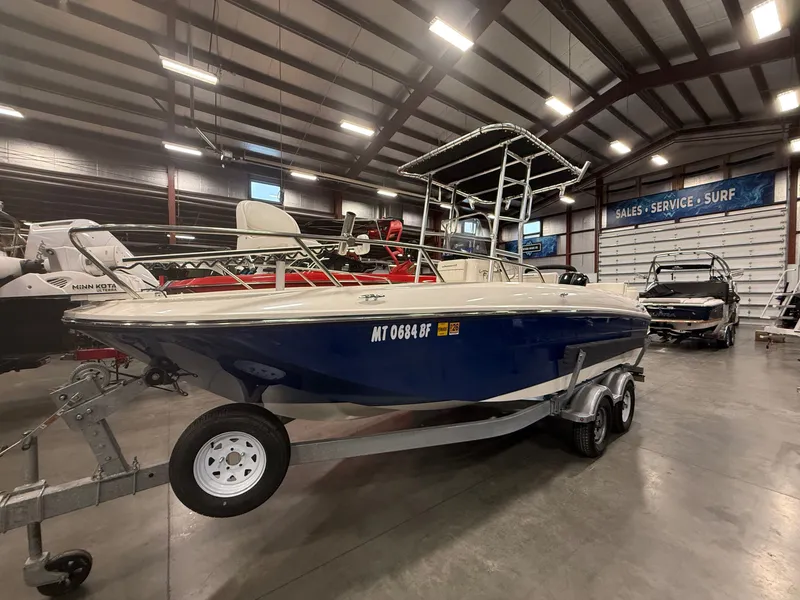 Slide: The Image of 2018 Bayliner Element F21 boat in a warehouse. - 3