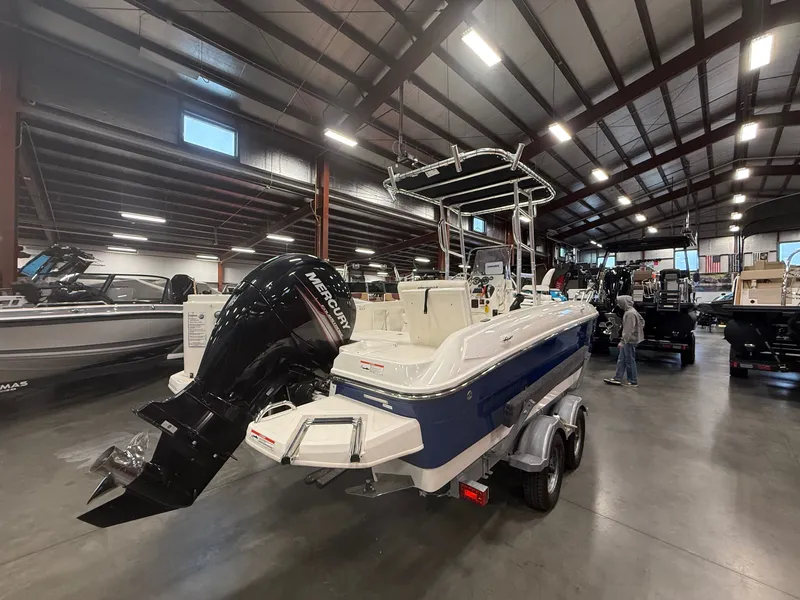 Slide: The Image of 2018 Bayliner Element F21 boat in a warehouse. - 7