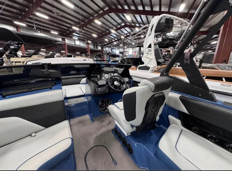 Slide: The Image of Interior of a 2021 Axis A24 boat in a showroom. - 10