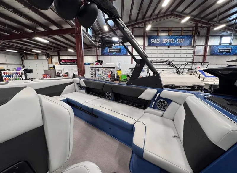 Slide: The Image of Interior of a 2021 Axis A24 boat in a workshop setting. - 6