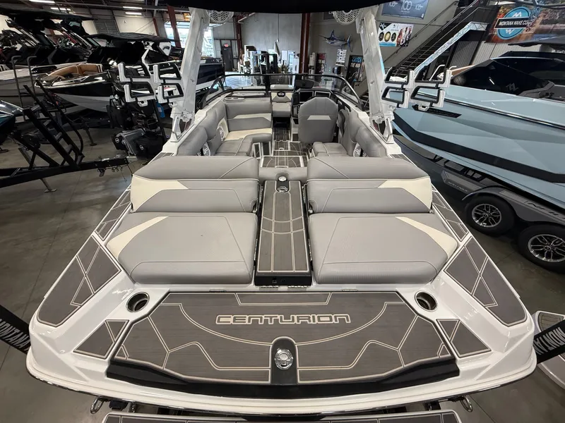 Slide: The Image of Interior view of 2023 Centurion Ri230 boat with gray upholstery. - 8