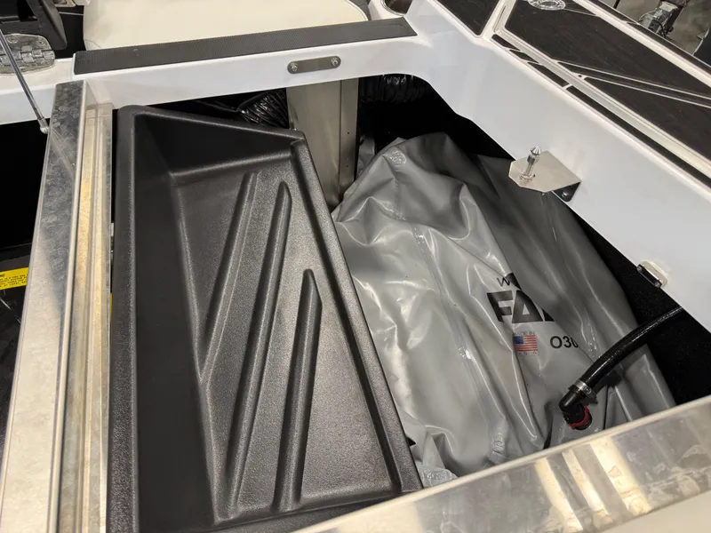 Slide: The Image of Interior view of 2024 Centurion Fi23 with storage and ballast system. - 10