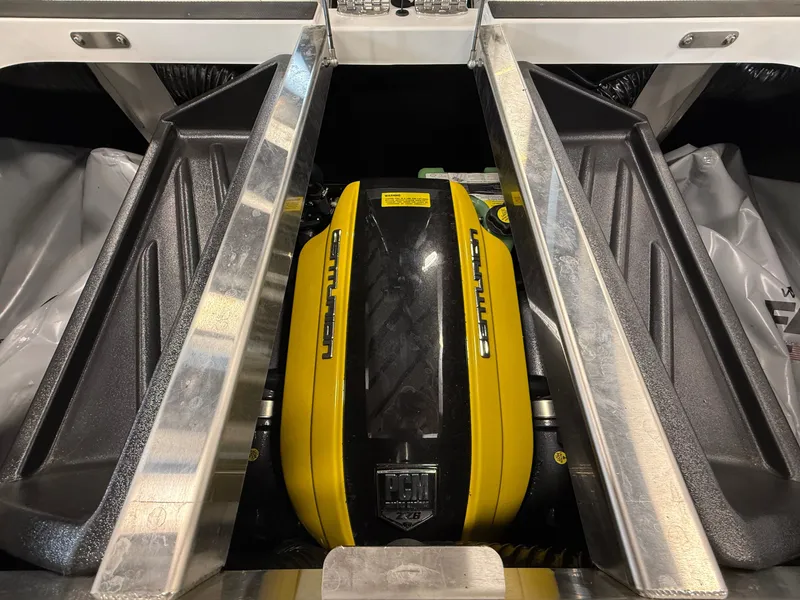 Slide: The Image of Engine compartment of 2024 Centurion Fi23 with yellow PCM engine. - 17