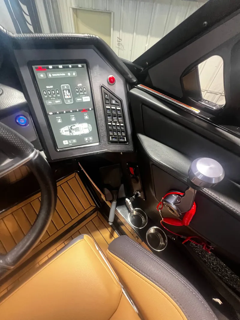 Slide: The Image of Interior of 2024 MasterCraft X STAR S with modern dashboard. - 12