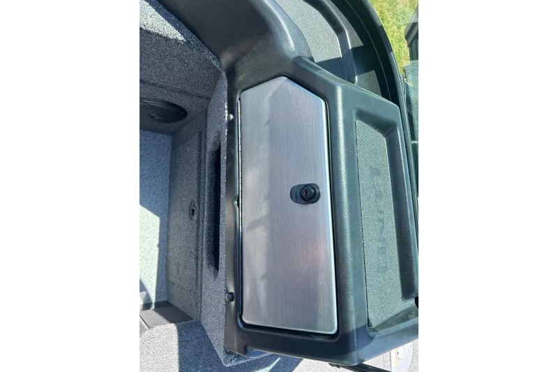 Slide: The Image of Storage compartment on 2026 Lund 1775 Impact XS Sport boat, featuring a sleek metallic finish. - 19