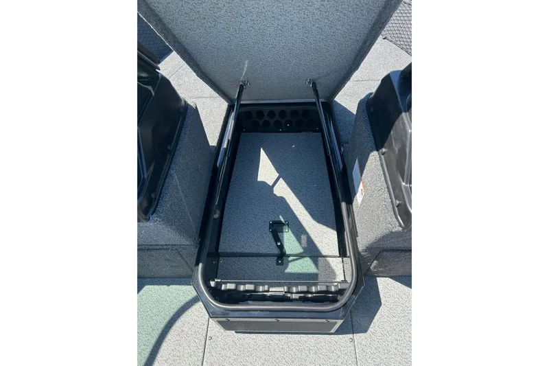 Slide: The Image of Open storage compartment in 2026 Lund 1775 Impact XS Sport boat. - 20