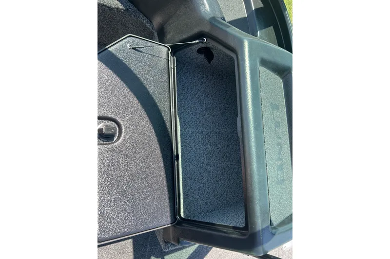 Slide: The Image of Open storage compartment in 2026 Lund 1775 Impact XS Sport boat. - 29