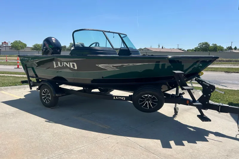 Slide: The Image of Manufacturer Provided Image: Aerial view of 2025 Lund 1775 Impact XS Sport boat speeding on water. - 36
