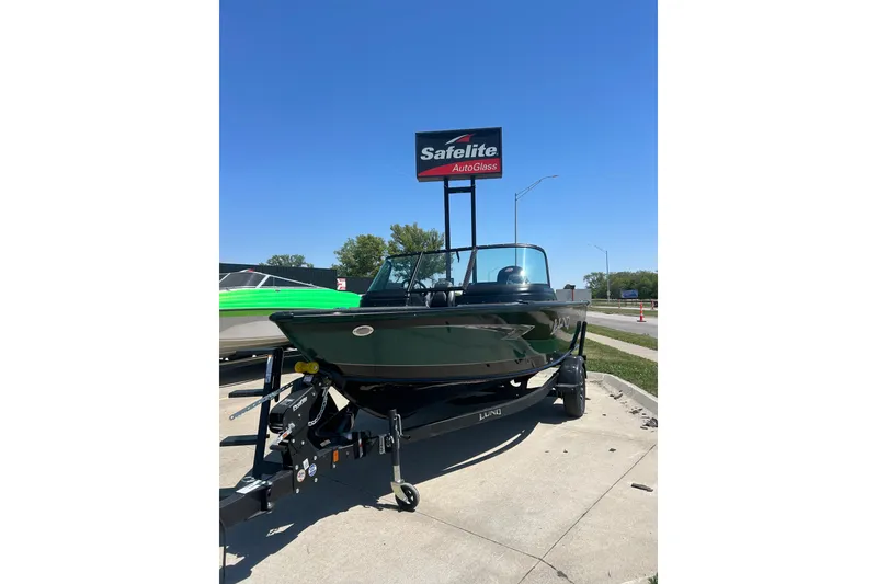Slide: The Image of Manufacturer Provided Image: Fishing rods on 2025 Lund 1775 Impact XS Sport boat deck. - 41