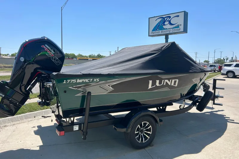 Slide: The Image of 2026 Lund 1775 Impact XS Sport boat with cover at Premier Boating Center. - 9