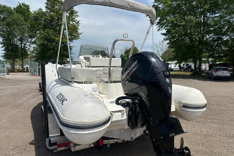 Slide: The Image of 2023 Zodiac N-ZO 680 boat with Mercury engine on a trailer. - 3