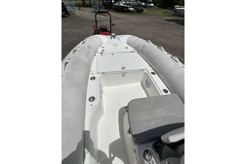 Slide: The Image of 2023 Zodiac N-ZO 680 inflatable boat interior with seating and storage compartments. - 7
