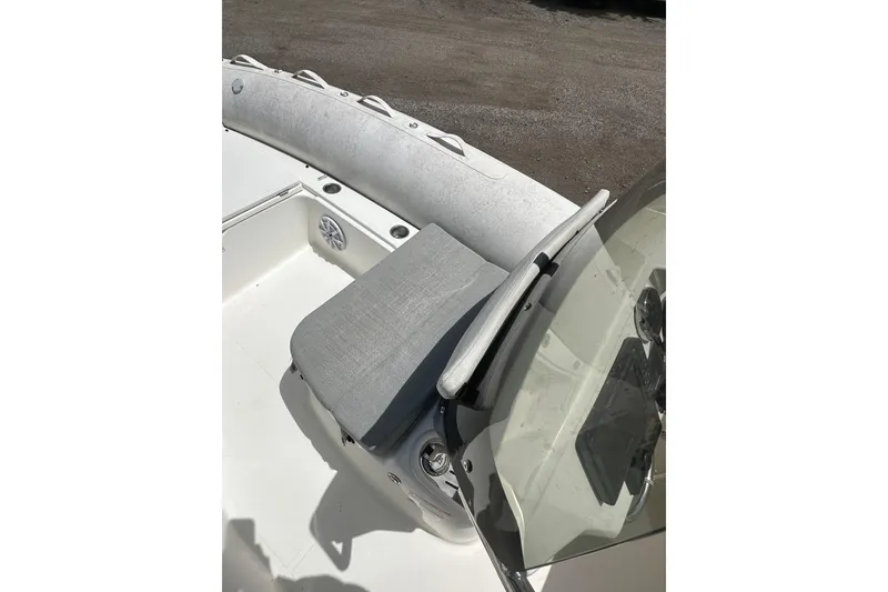 Slide: The Image of 2023 Zodiac N-ZO 680 boat interior with cushioned seating and steering console. - 8