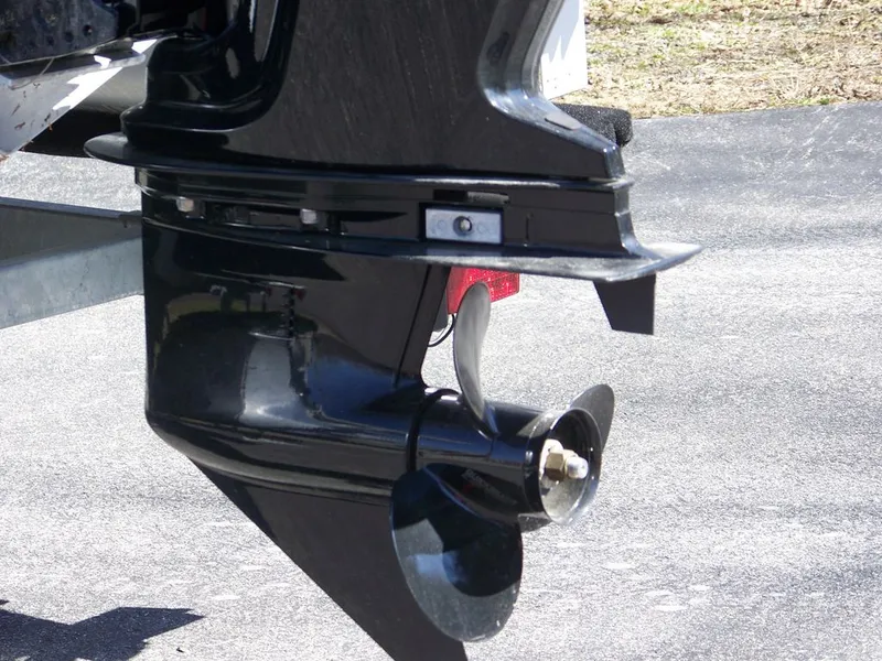 Slide: The Image of Starcraft LX 20 R 2024 outboard motor with propeller on asphalt. - 11