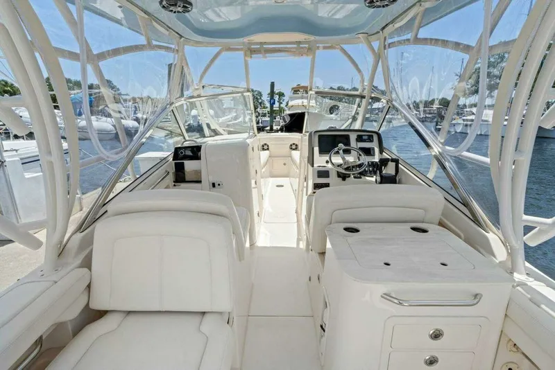 Slide: The Image of Interior view of a 2022 Grady-White FREEDOM boat at the dock. - 10