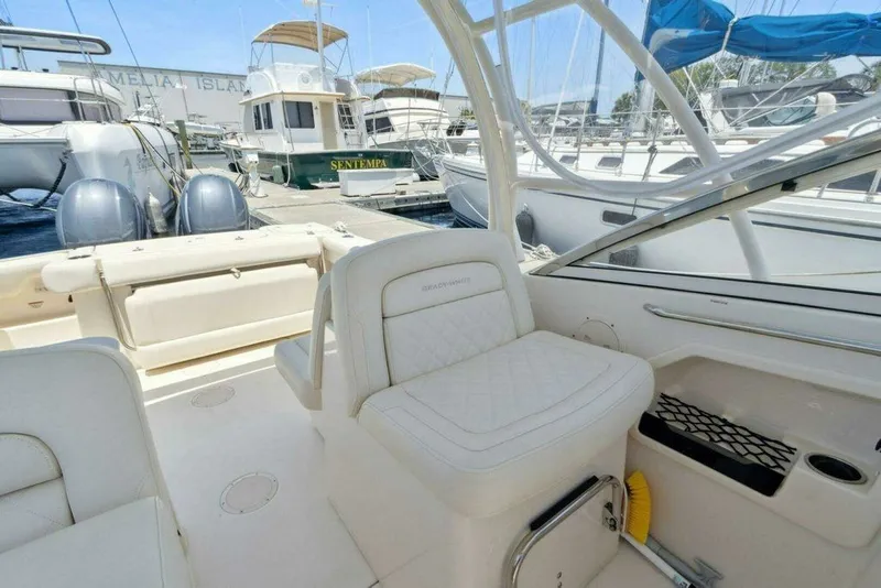 Slide: The Image of Grady-White FREEDOM 2022 boat at dock, luxurious interior. - 17