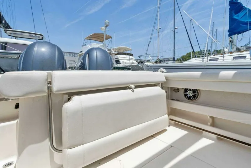 Slide: The Image of Grady-White FREEDOM 2022 boat with luxurious interior at the marina. - 19