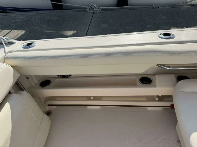 Slide: The Image of Interior of a 2022 Grady-White FREEDOM boat with beige seating. - 25