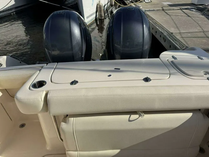 Slide: The Image of Grady-White FREEDOM 2022 boat with twin outboard motors at dock. - 30