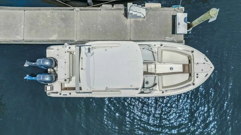 Slide: The Image of Aerial view of 2022 Grady-White FREEDOM boat docked. - 35