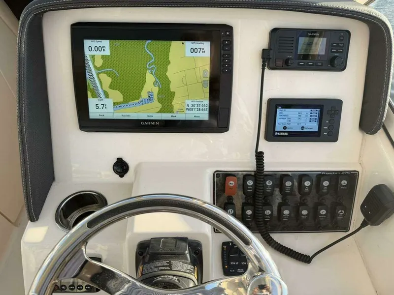 The Image of Grady-White FREEDOM 2022 boat dashboard with Garmin navigation system. - 6