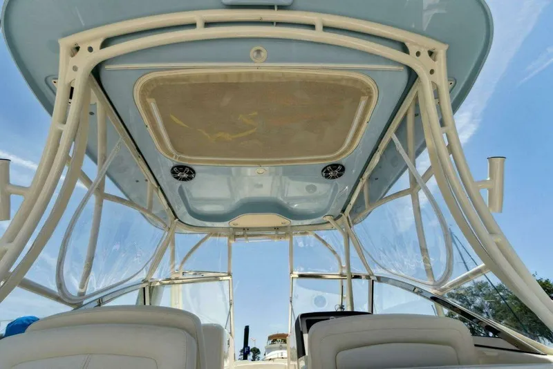Slide: The Image of Interior view of a 2022 Grady-White FREEDOM boat with glass canopy. - 9