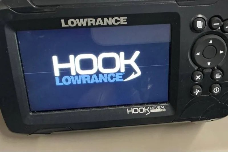 Slide: The Image of Lowrance HOOK Reveal fish finder on 2021 Barletta E24UC boat dashboard. - 13
