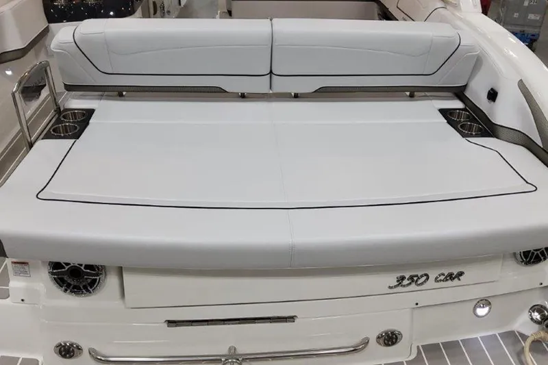 Slide: The Image of 2025 Formula 350 Crossover Bowrider I/O with spacious rear seating and cup holders. - 2