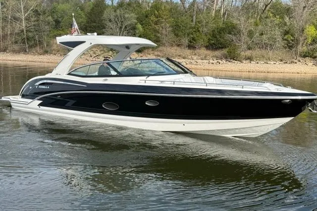 Slide: The Image of 2025 Formula 350 Crossover Bowrider I/O cruising on a calm lake. - 20