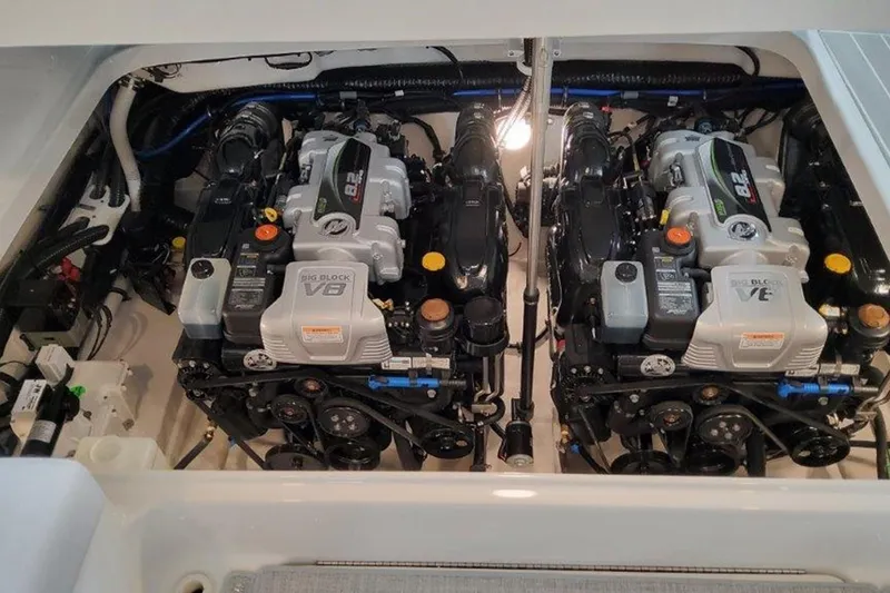Slide: The Image of Twin V8 engines in a 2025 Formula 350 Crossover Bowrider I/O boat. - 4
