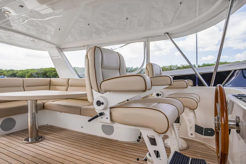 Slide: The Image of Luxurious interior of 2023 Grand Banks GB54 yacht with plush seating and elegant design. - 32