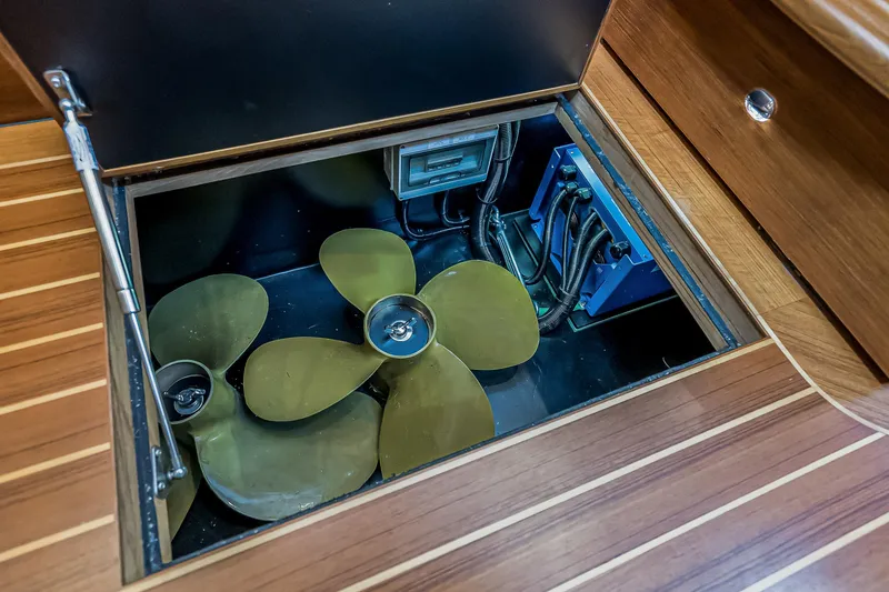 Slide: The Image of Engine compartment of 2023 Grand Banks GB54 yacht with propeller and wiring. - 63