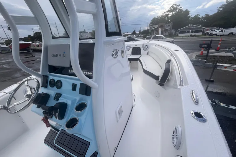 Slide: The Image of 2023 Tidewater 232 CC Adventure boat interior with Garmin navigation system. - 8